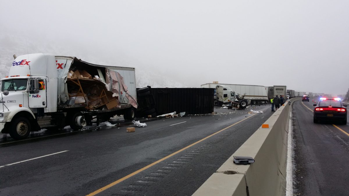 Black ice and a jackknifed semitruck cause massive crash on I84