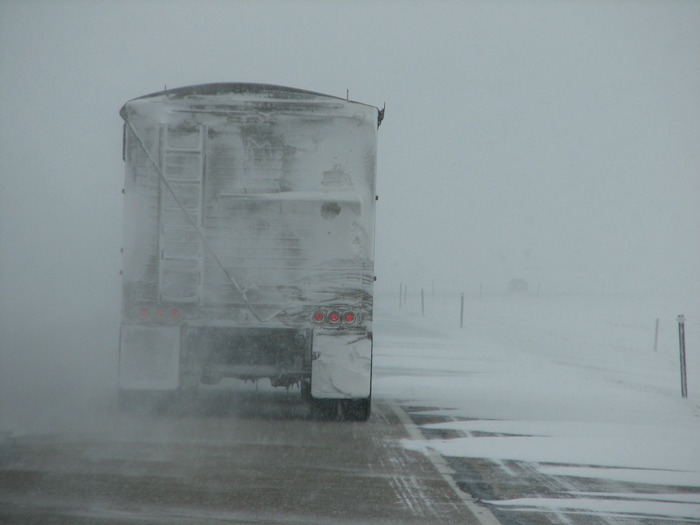 Truckers hauling essentials and weathering storms